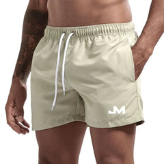 Quick drying, mid-length beach shorts Pea Green Beachwear Australia