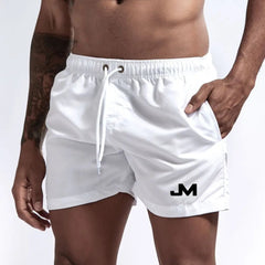 Quick drying, mid-length beach shorts White Beachwear Australia