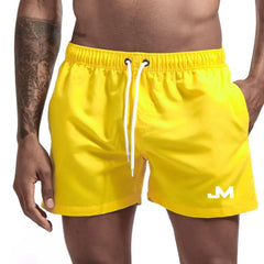 Quick drying, mid-length beach shorts Yellow Beachwear Australia