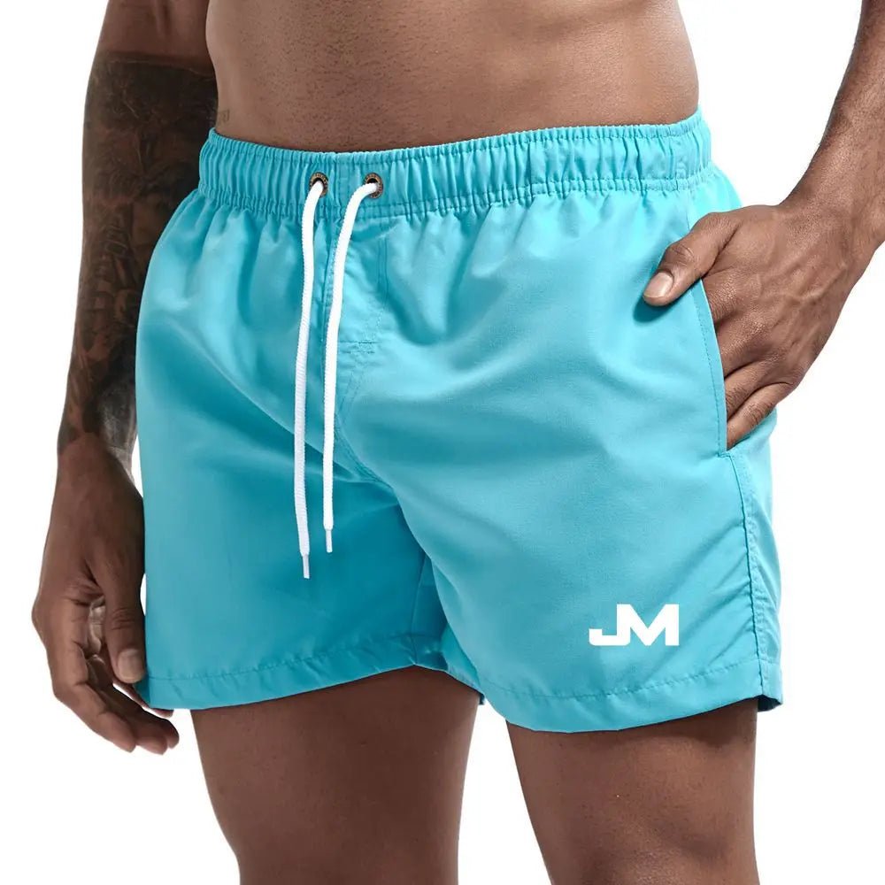 Quick drying, mid-length beach shorts Sky Blue Beachwear Australia