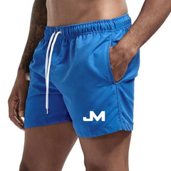 Quick drying, mid-length beach shorts Blue Beachwear Australia