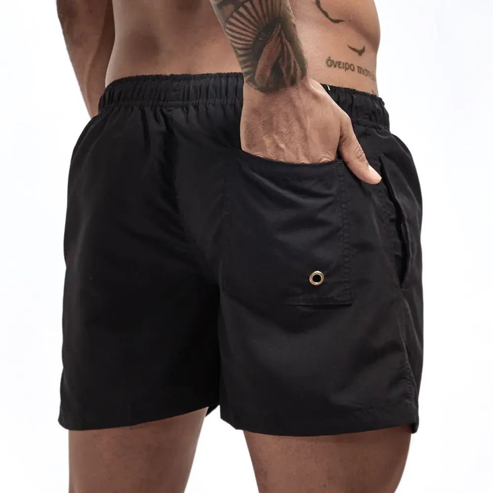 Quick drying, mid-length beach shorts Black Beachwear Australia